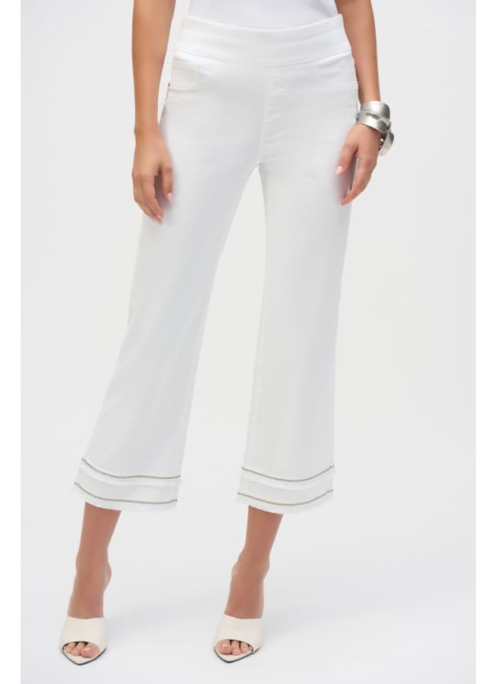 Joseph Ribkoff białe spodnie jeans z postrzępioną nogawką zdobioną cekinami 252913-2